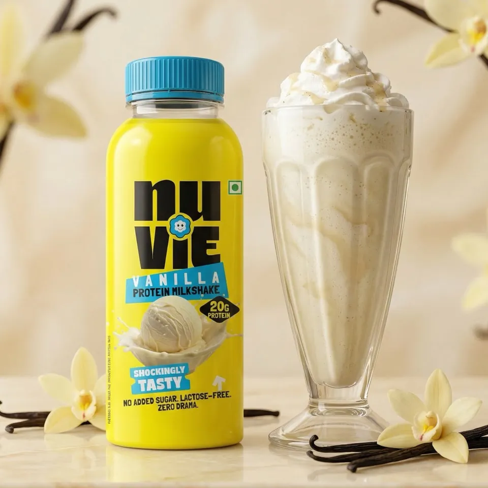 Vanilla shake bottle with a glass of vanilla milkshake
